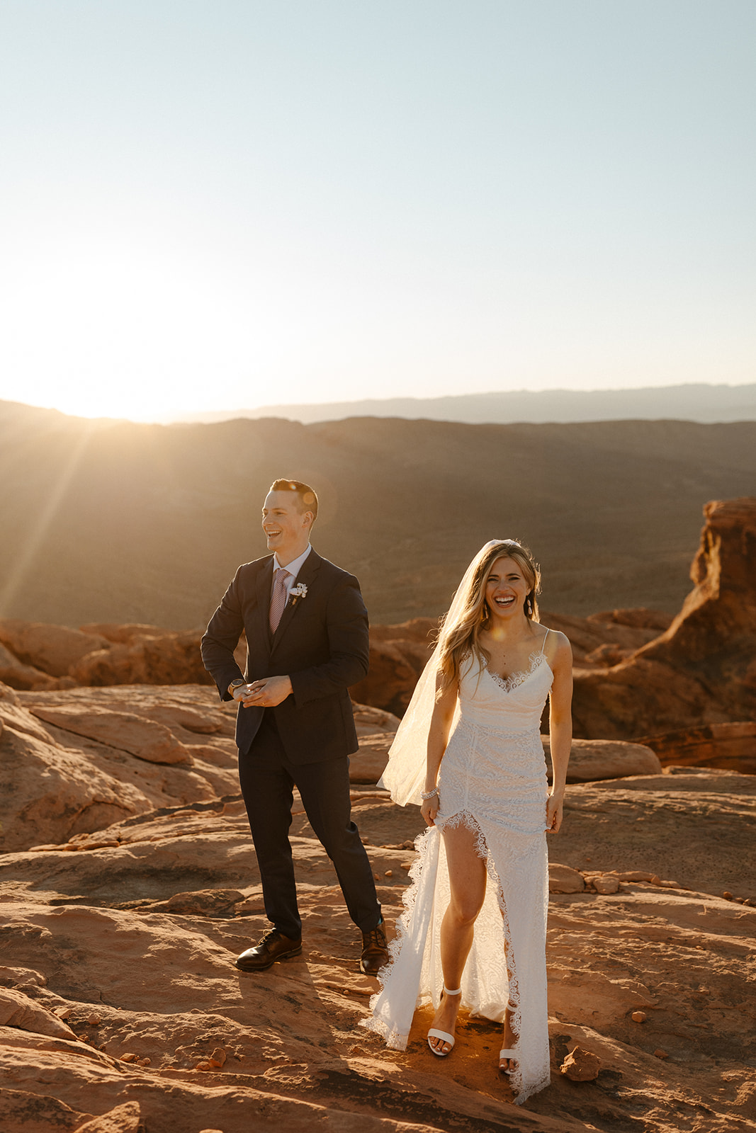 bride and groom on top of valley of fire