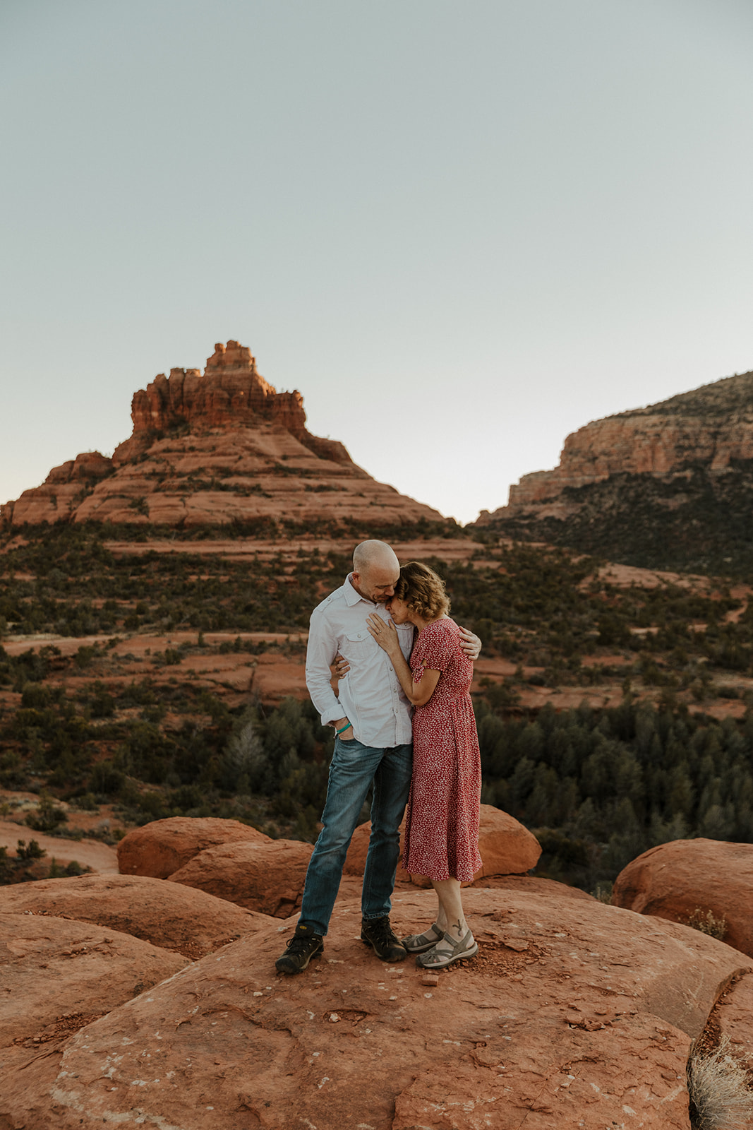 happy couple after the arizona proposal with view in background