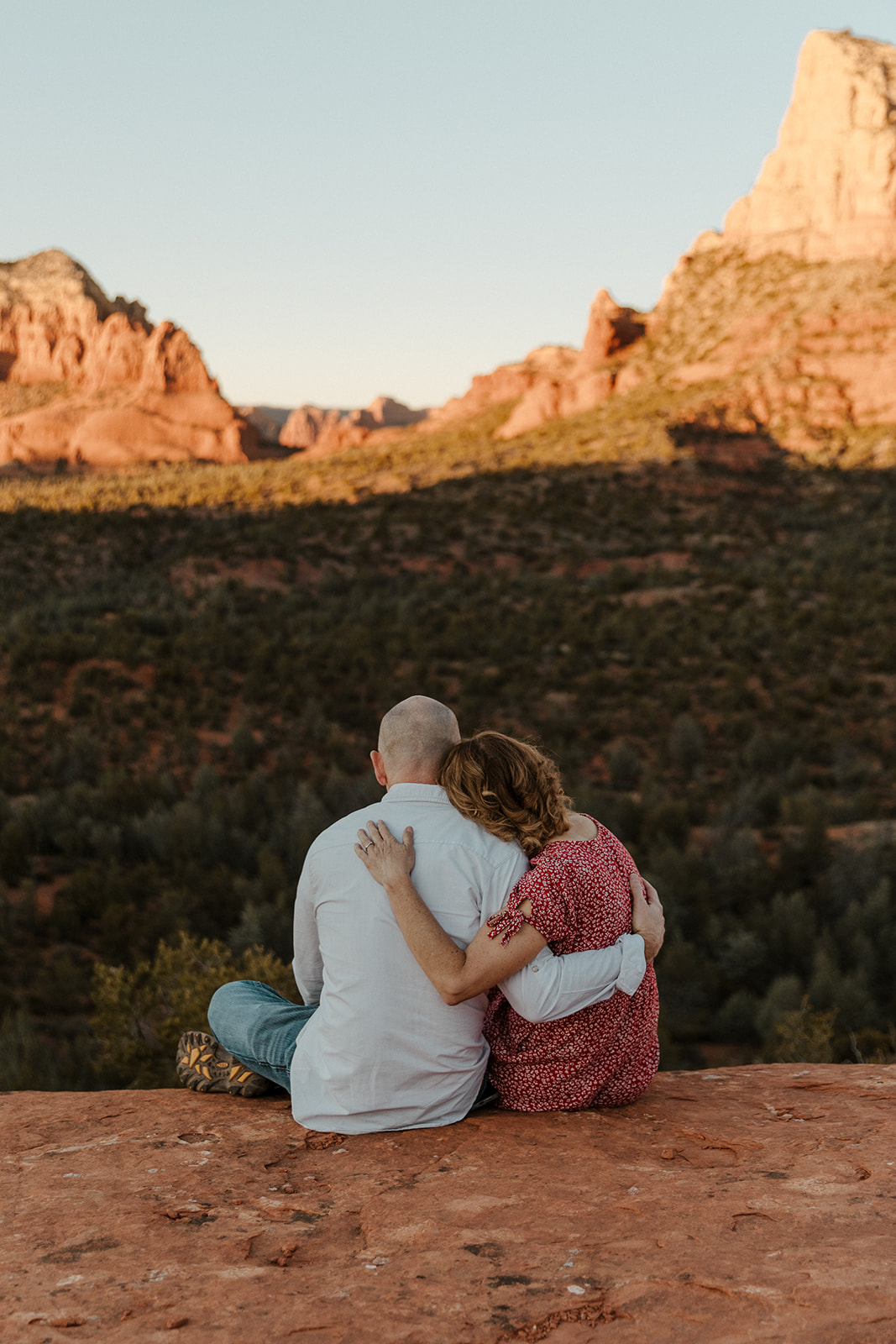 happy couple after the arizona proposal with view in background