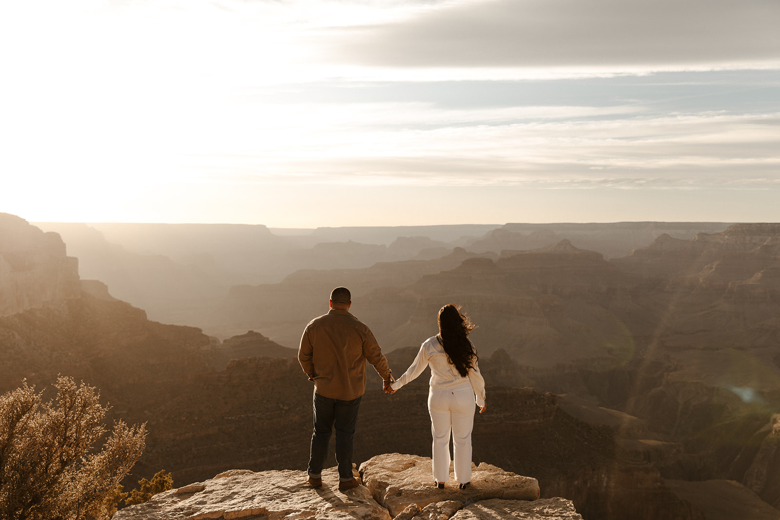 Grand Canyon Engagement Photos with couples back turned 