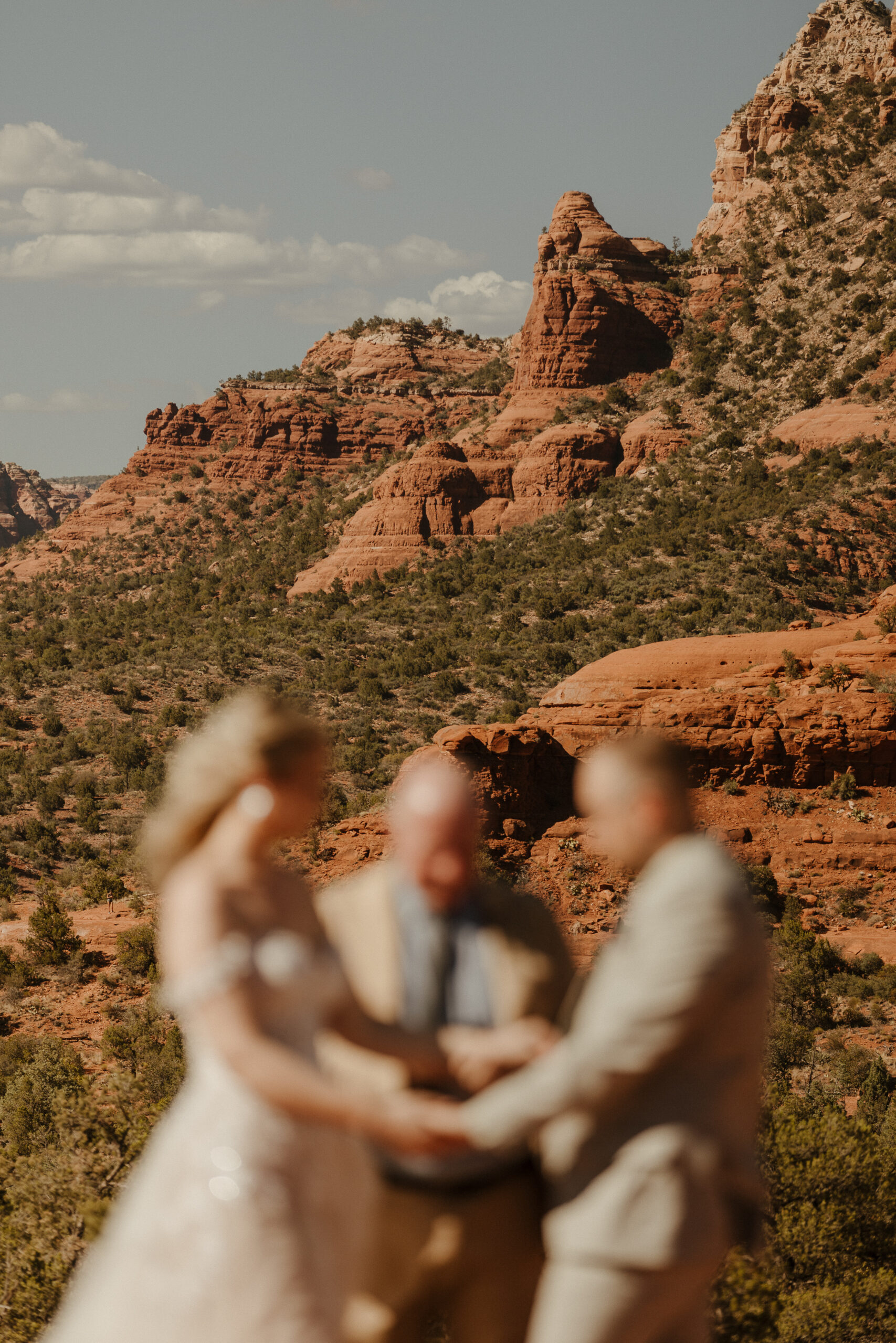 sedona landscape with bride and groom blurred