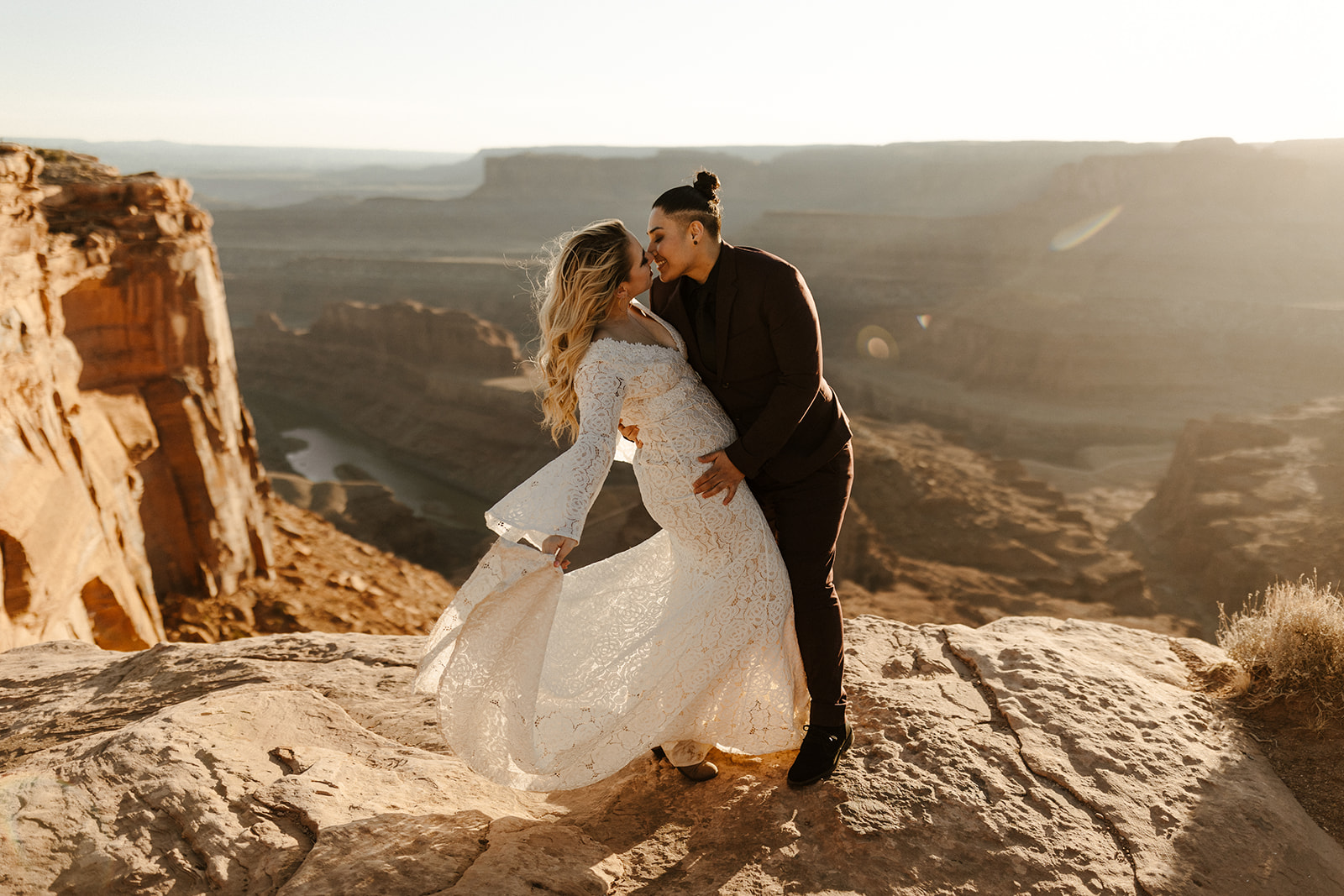 bridal couple with moab elopement scenery