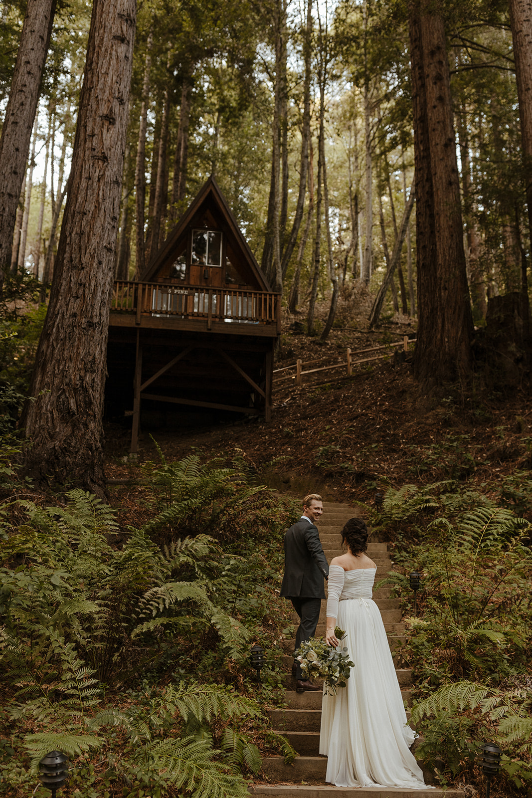 bride and groom portrait at redwood forest wedding with lush scenery