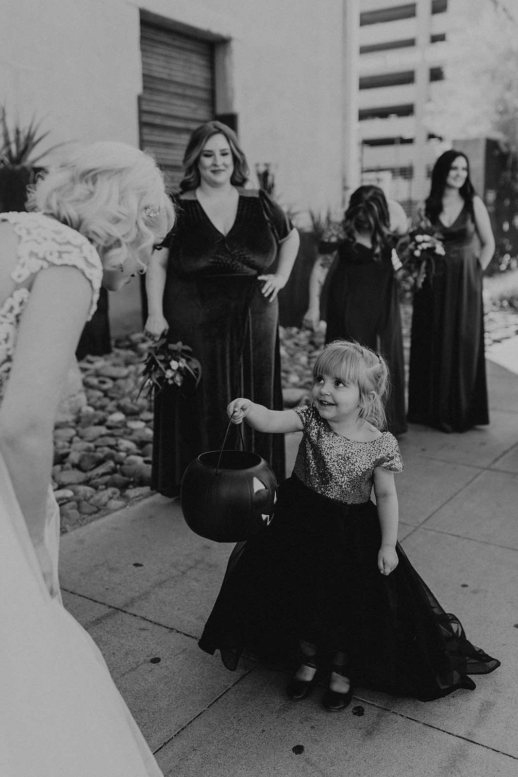 black and white of bride, bridesmaids and flower girls 
