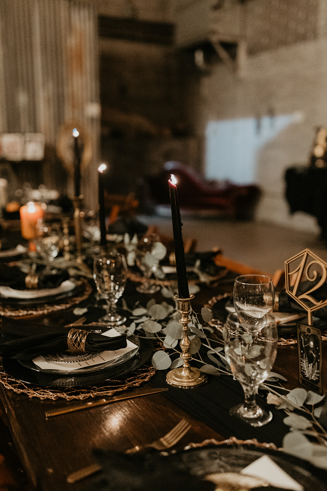 romantic and moody reception table decor at fall halloween wedding 