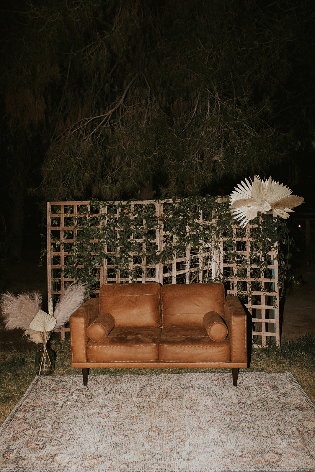 boho decorations and couch set up at arizona forest wedding 