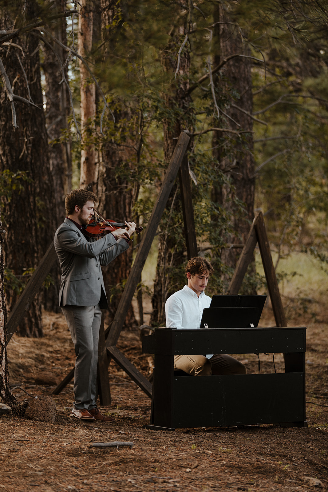 musicians during wedding ceremony in the woods in arizona