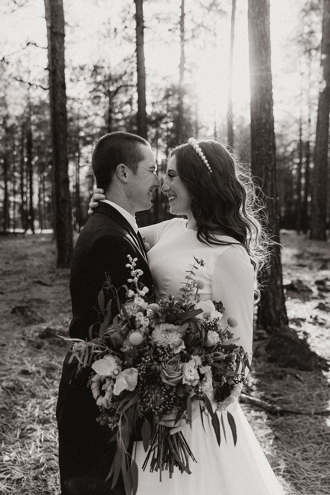 bride and groom portraits in the woods