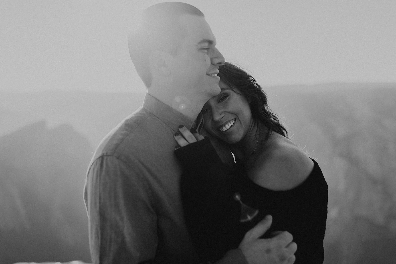 black and white of couple embracing 