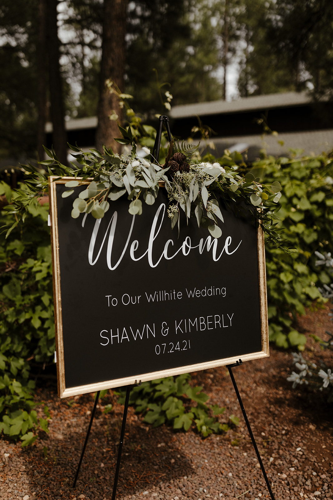 wedding signage in the woods