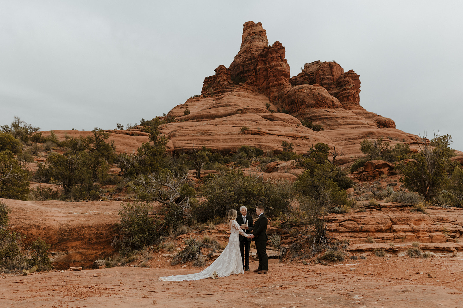 bride and groom at their ceremony at bell rock