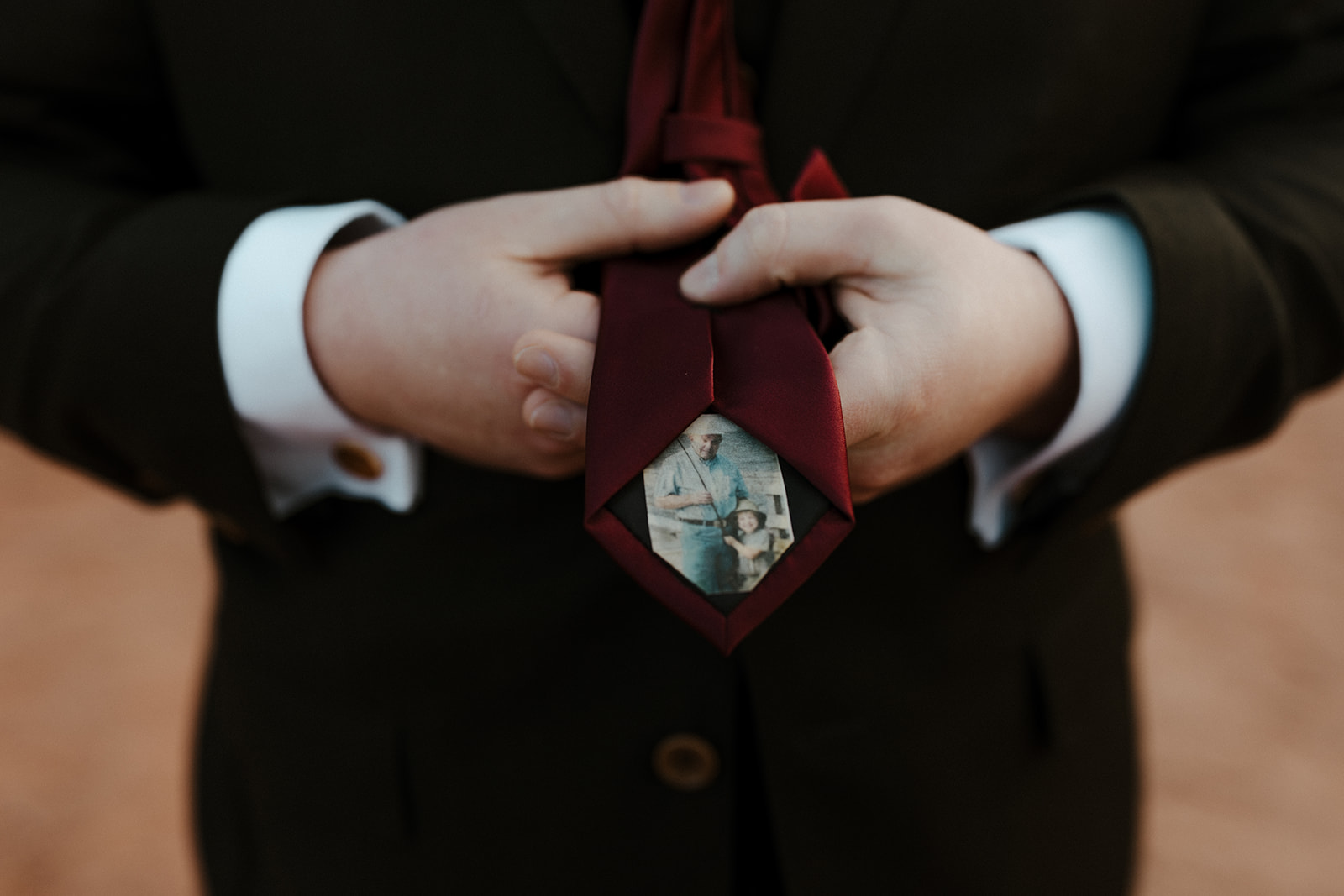 grooms tie with a picture on the inside 