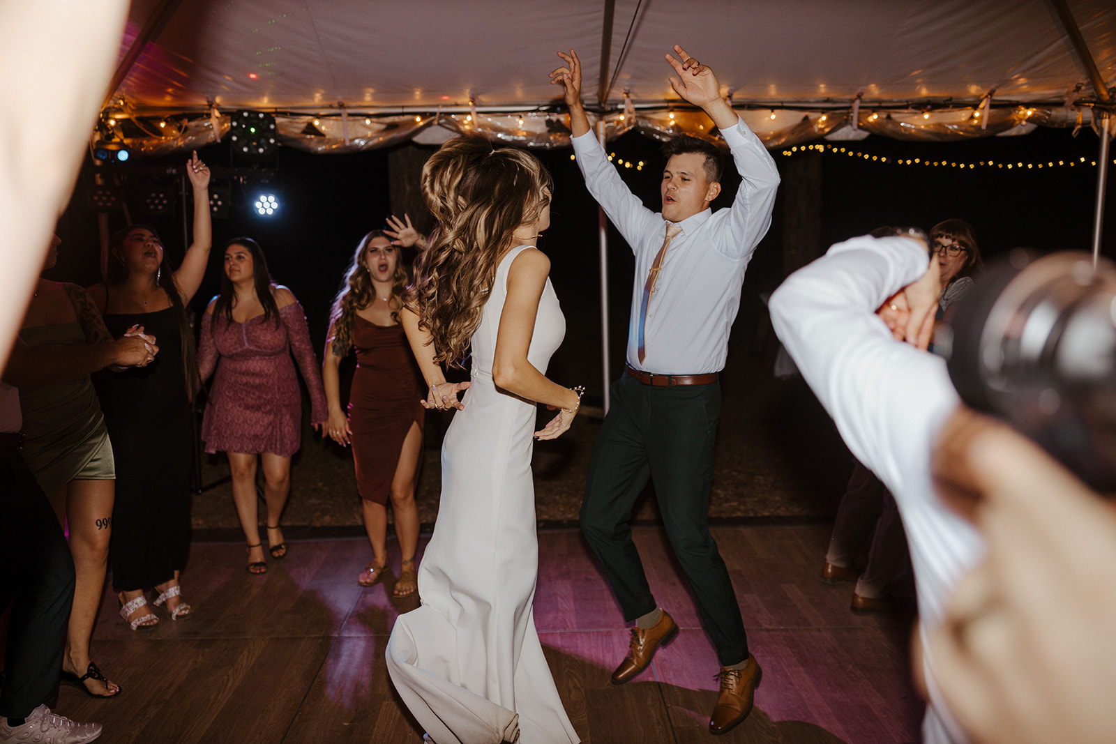 bride and groom dancing at intimate forest wedding 
