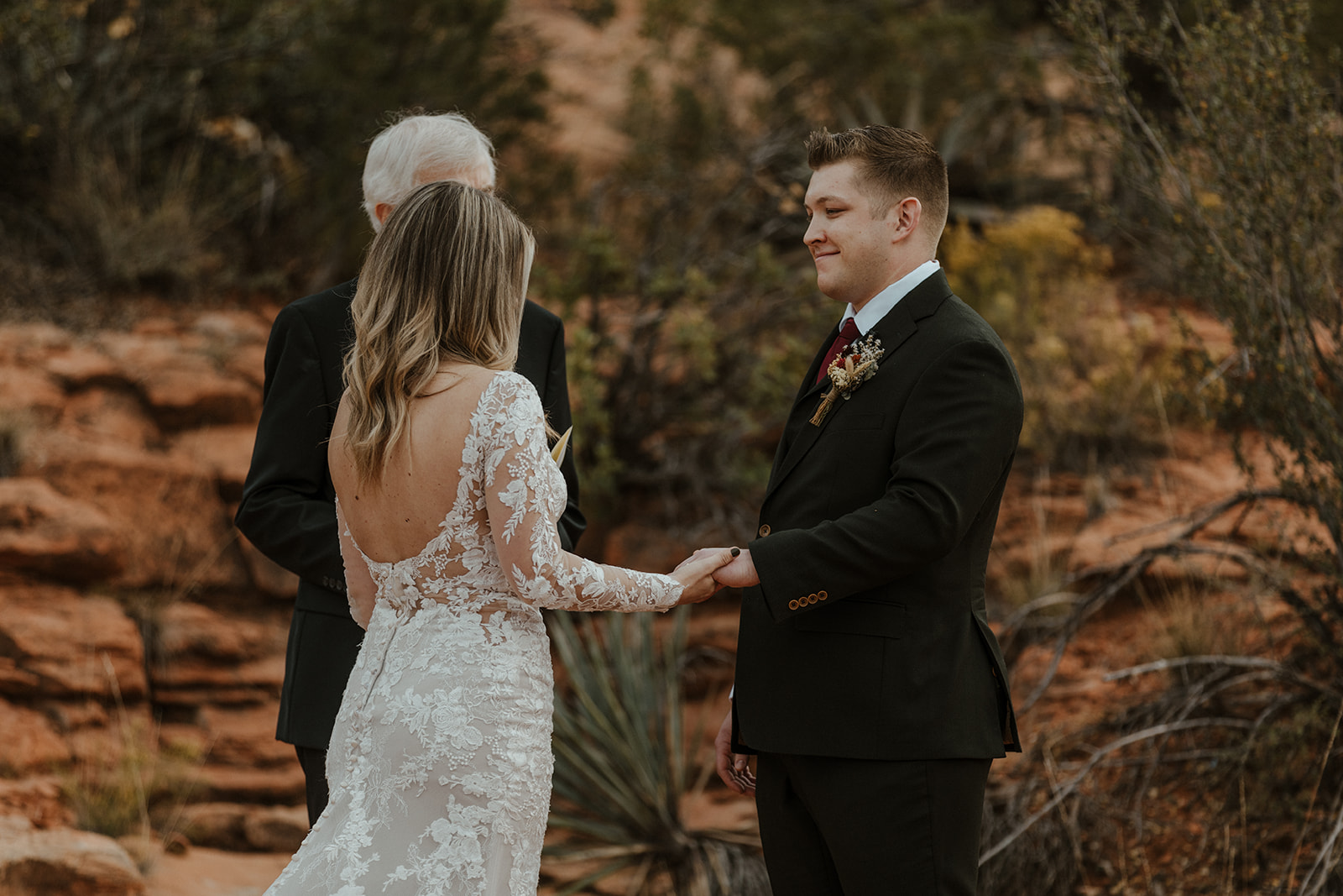 groom smiling during the ceremony at sedona elopement wedding 