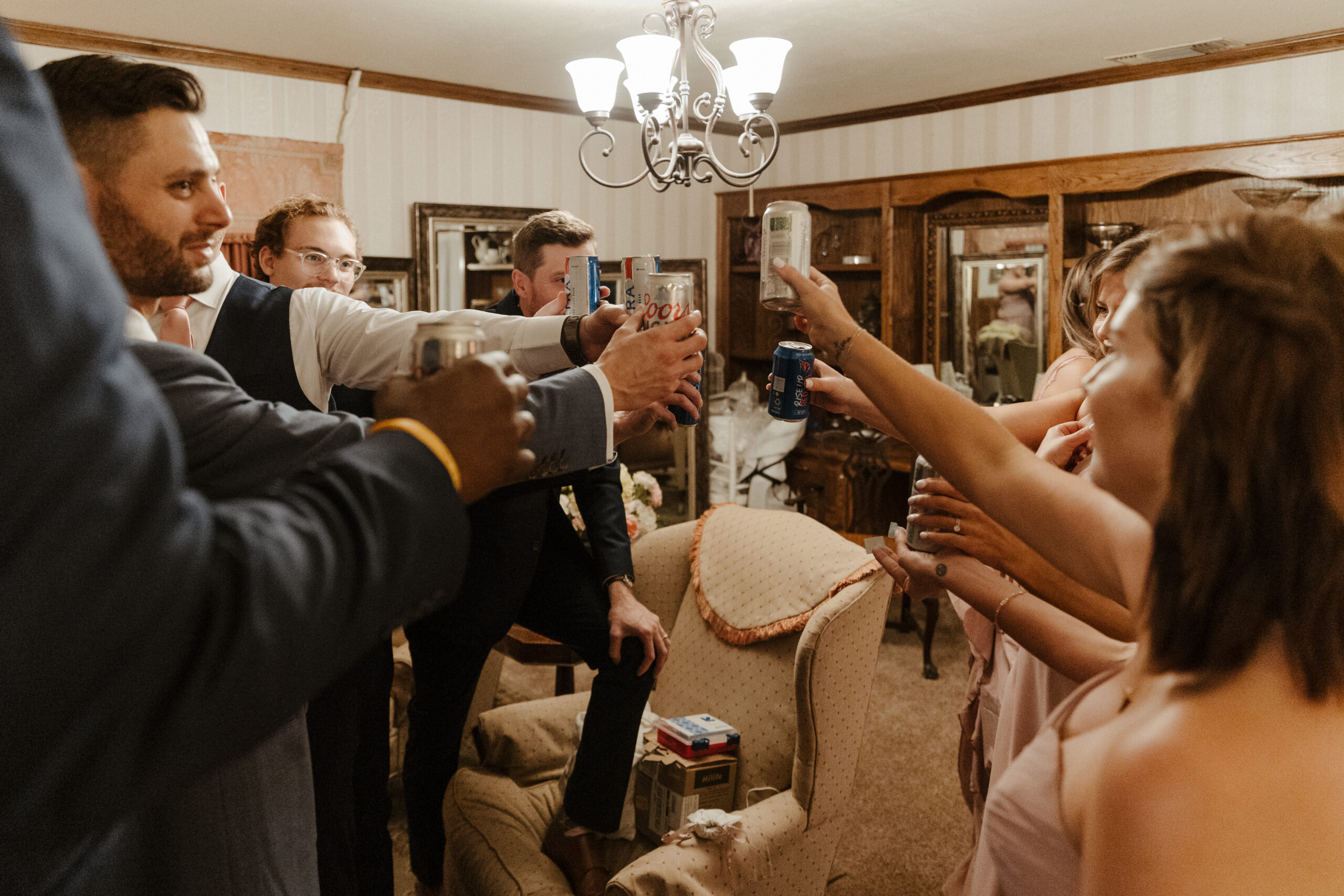 bridal party cheersing before wright house wedding ceremony 