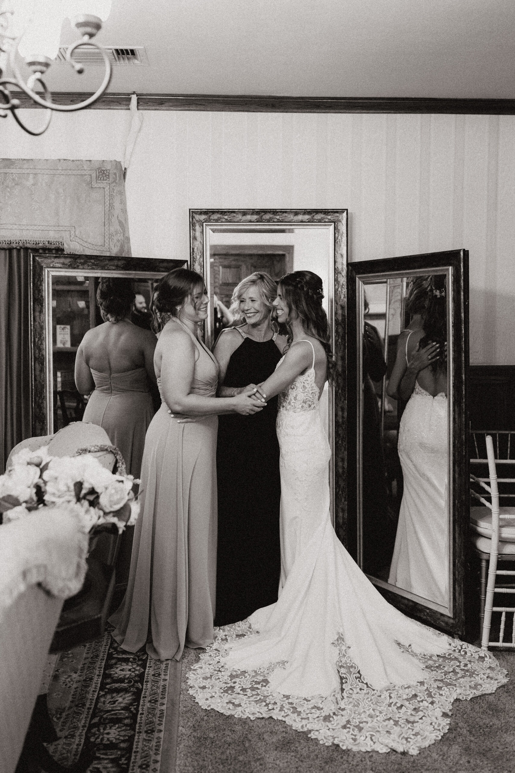 black and white candids of bride and loved ones while she is getting ready for garden wedding in arizona 