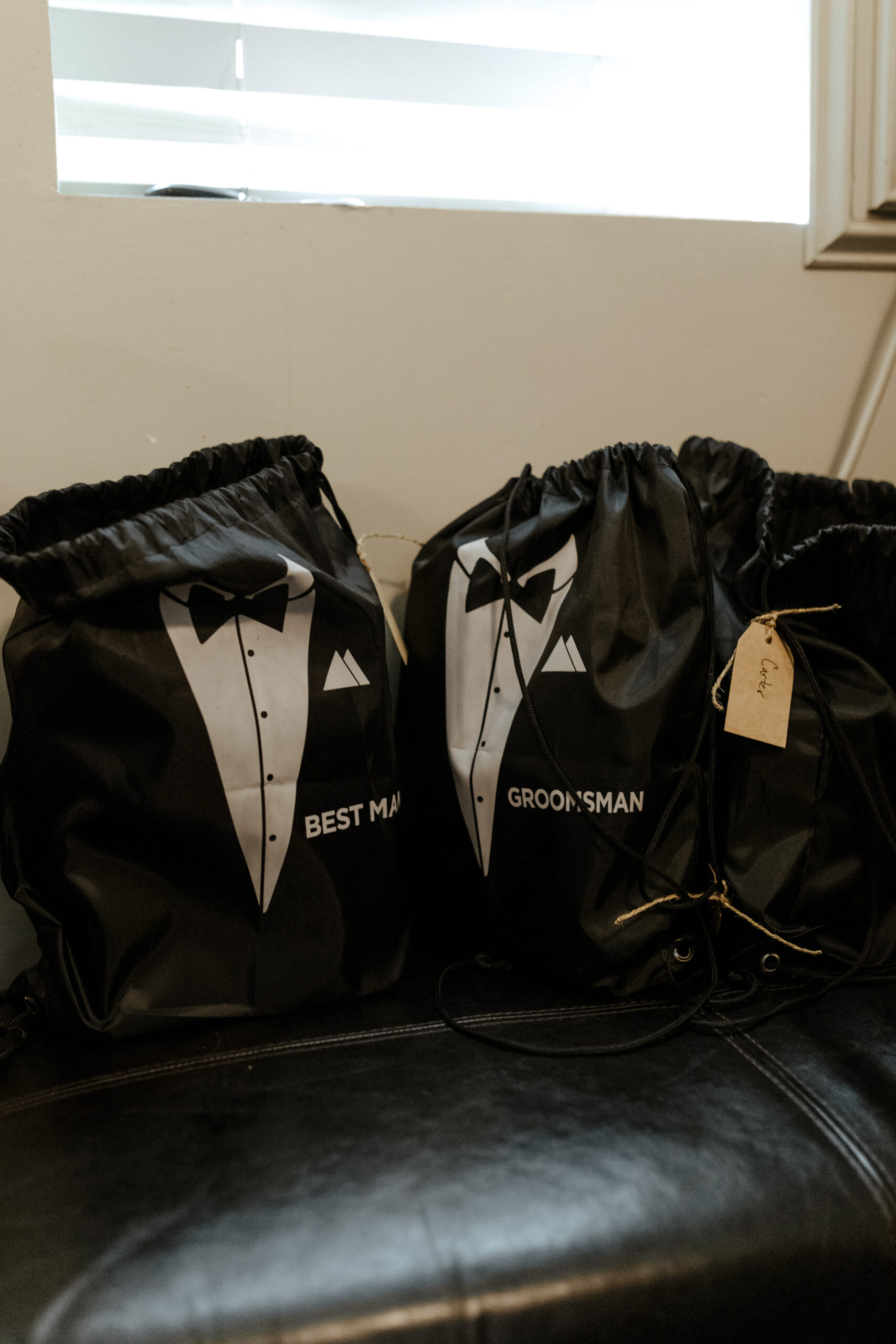 groomsmen's bags that look like tuxedos 