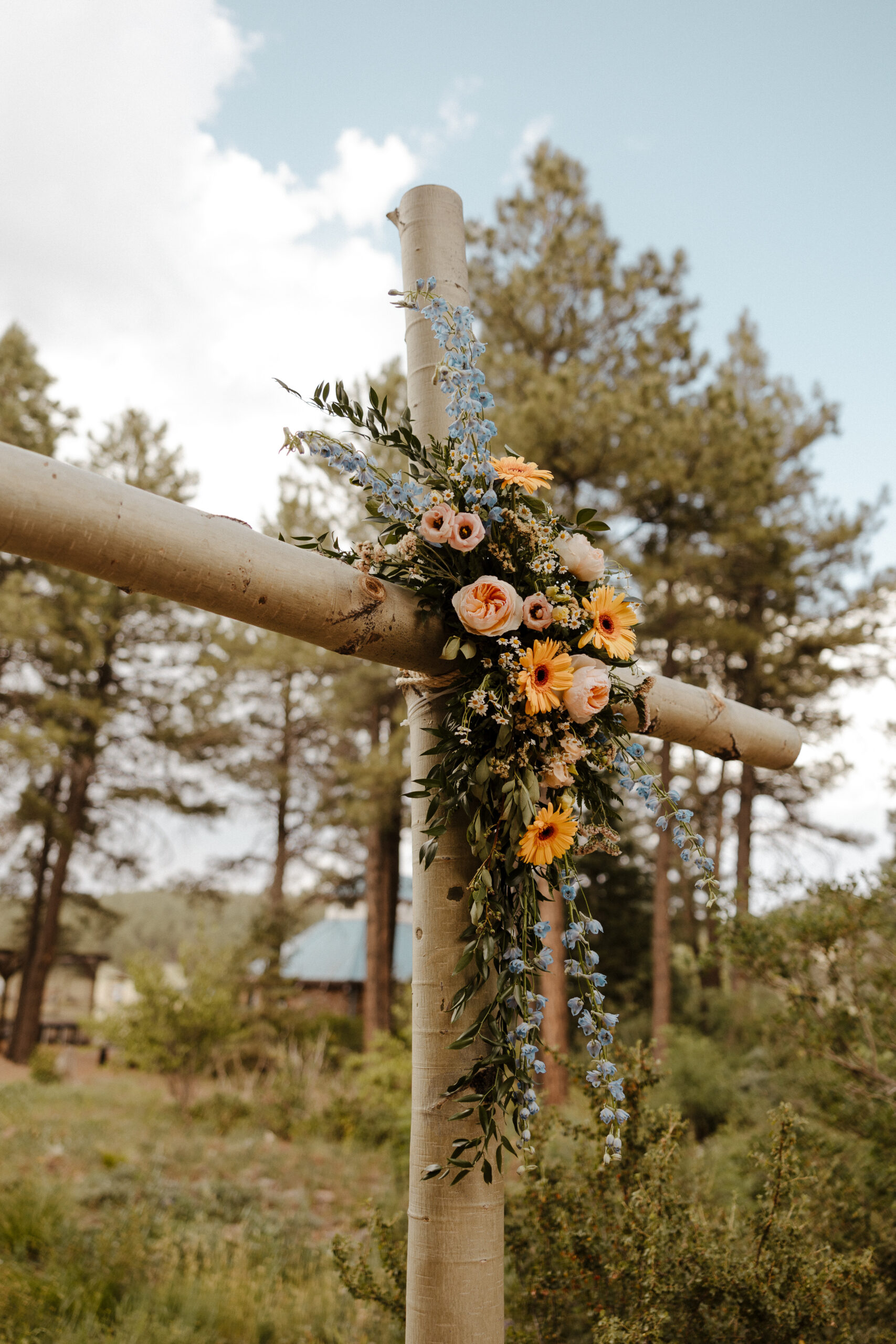 flowers on cross altar