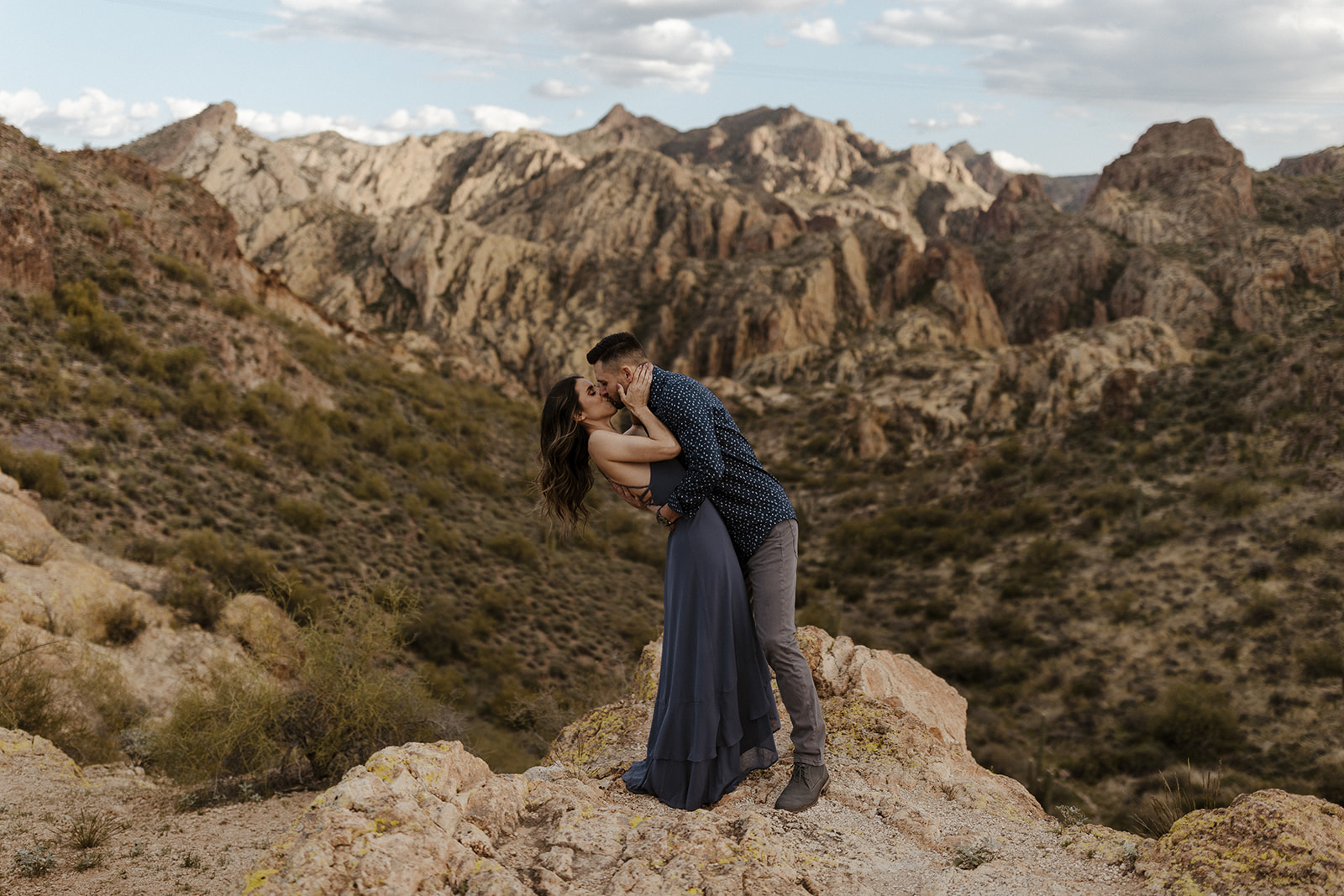 couple kissing during engagement pictures at canyon lake
