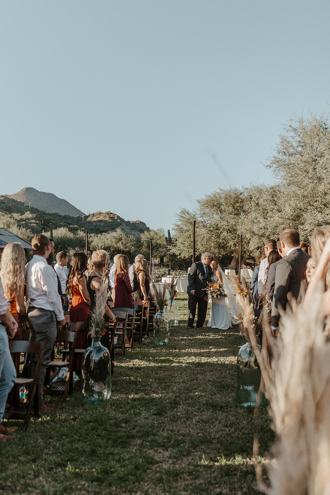 bride and father walking down the aisle at Saguaro Lake Guest Ranch Wedding