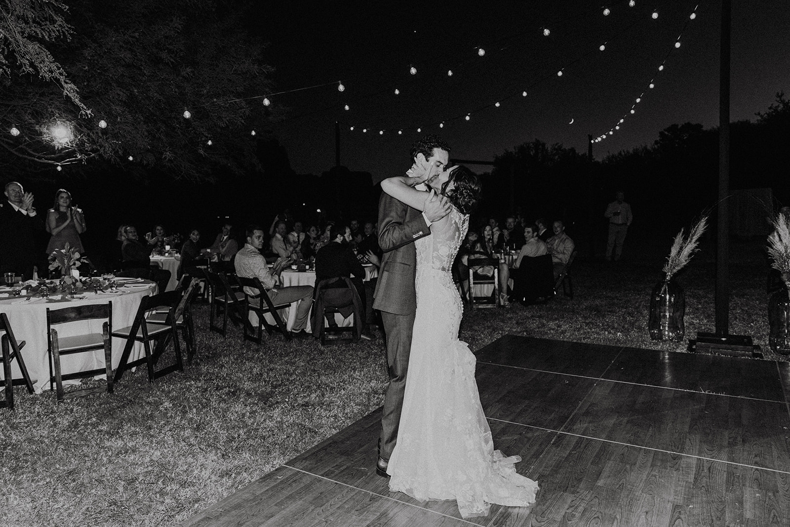 black and white of wedding couple's first dance at Arizona desert wedding