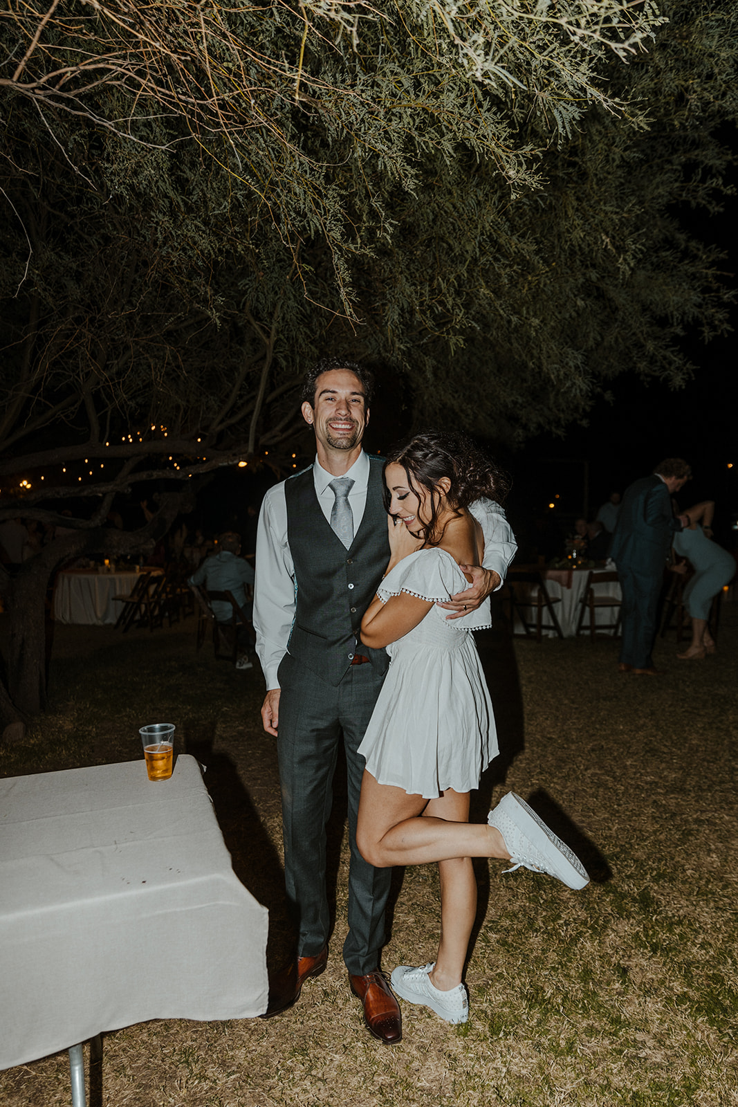 bride and groom posing at wedding reception dance 