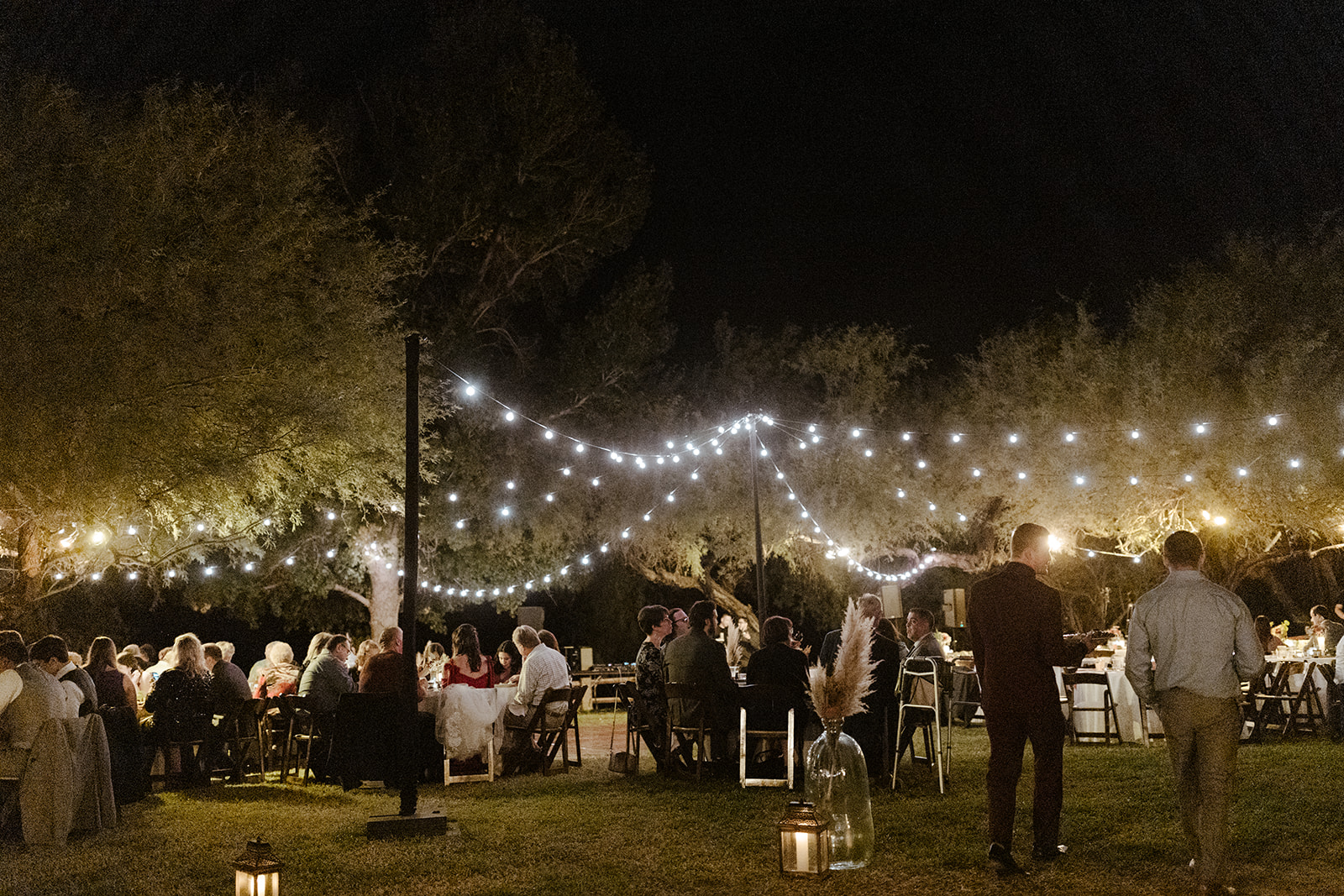 reception lighting with guests mingling 