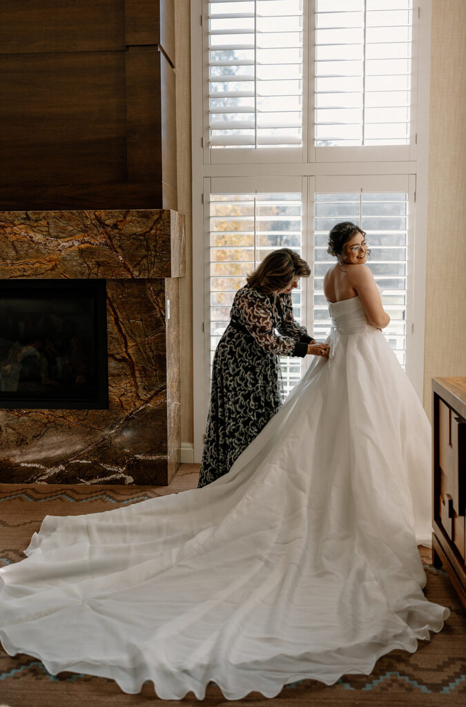 Stunning bride poses as she finalizes her prep for her stunning Flagstaff wedding day