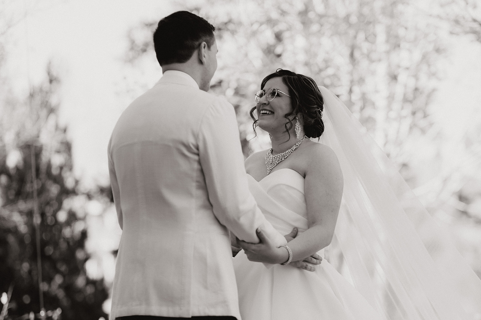 Stunning bride and groom pose together after their dreamy Flag Staff, Arizona wedding