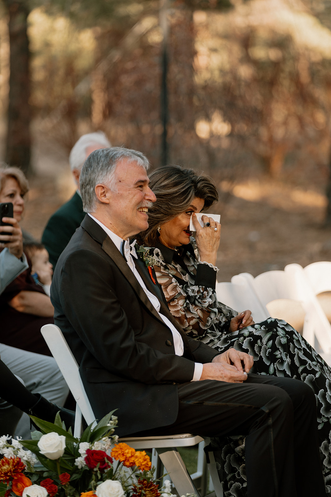 Brides mom and dad cry during their daughters dreamy wedding day