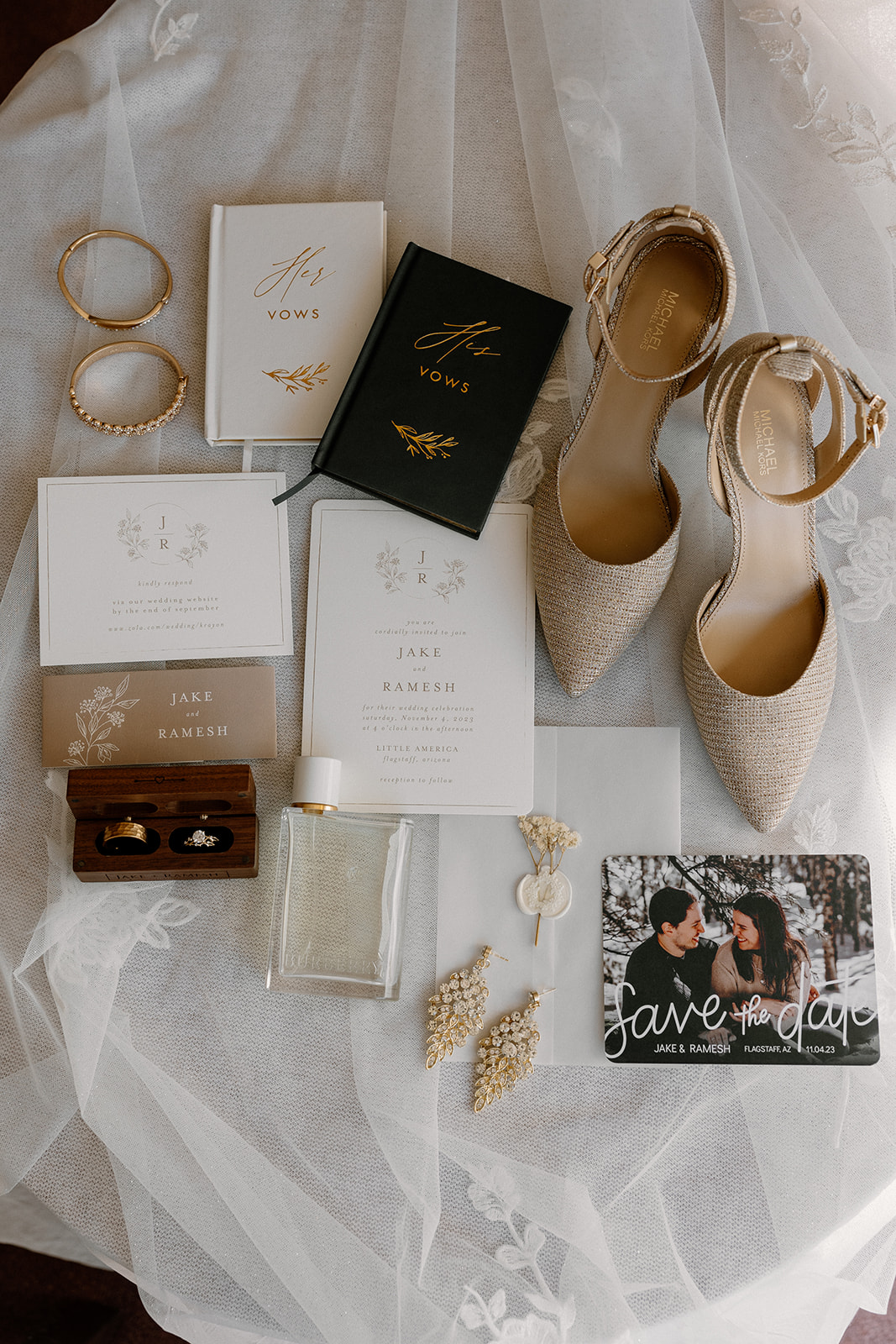 Brides wedding details laid out for a creative wedding detail flat lay photo