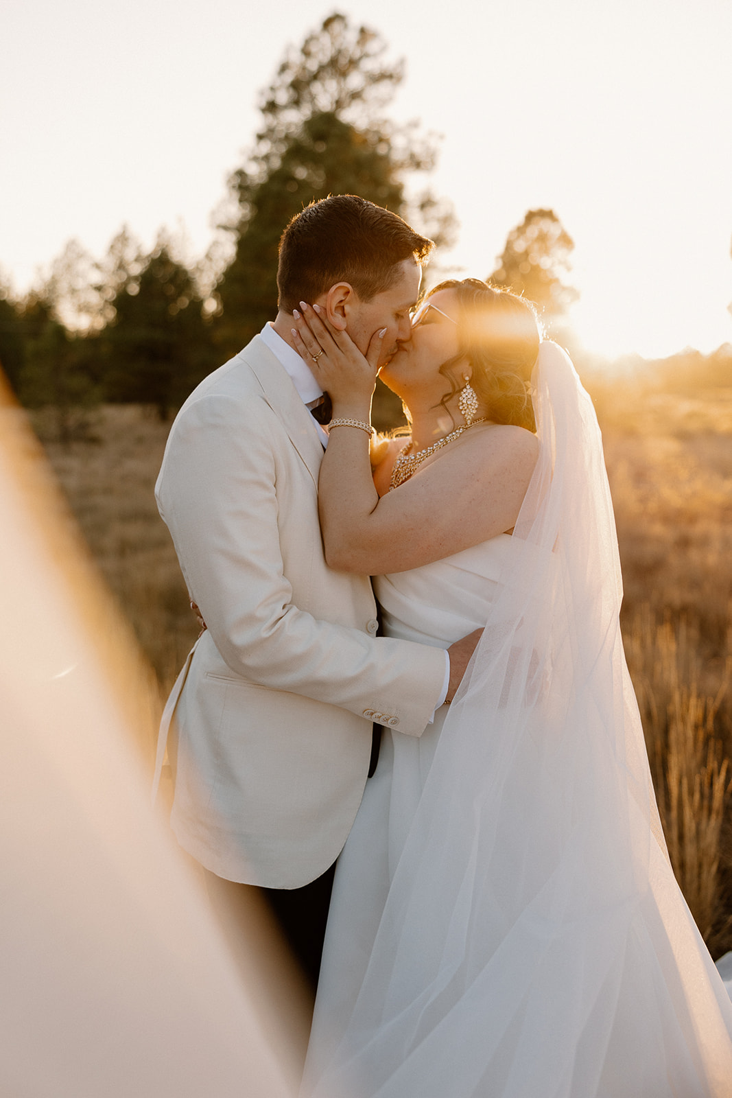 Stunning bride and groom pose together in the Arizona nature