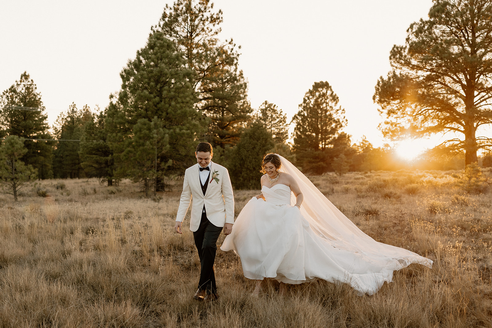 Stunning bride and groom pose together after their dreamy Flag Staff, Arizona wedding