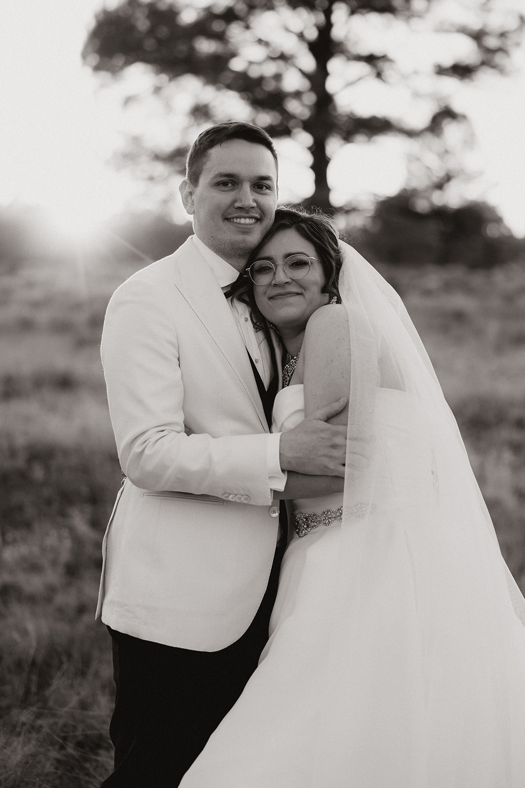 Stunning bride and groom pose together after their dreamy Arizona wedding