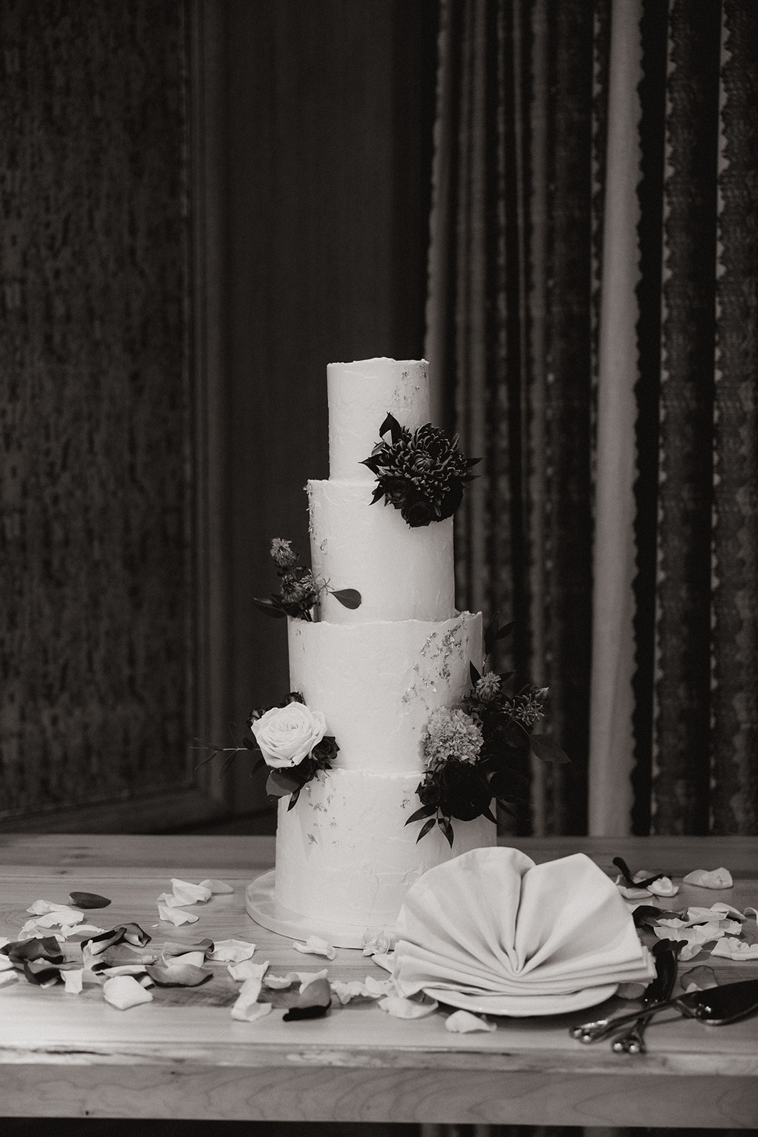 Wedding cake sits ready for slicing during an Arizona wedding reception
