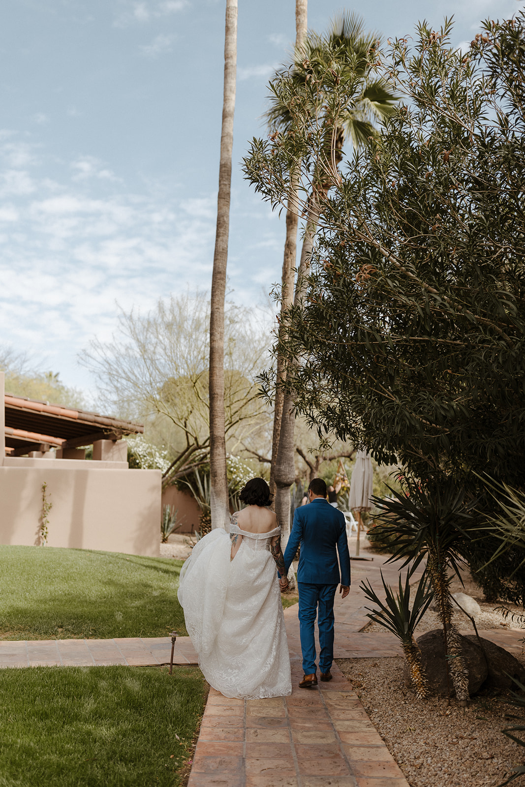Bride and groom pose after their dreamy Arizona wedding day at The Hermossa Inn 