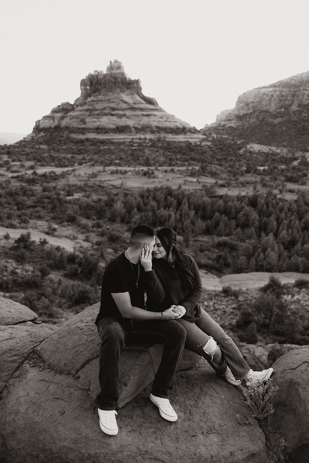 beautiful couple share an intimate moment during their dreamy west fork trail in Sedona Arizona engagement photoshoot 