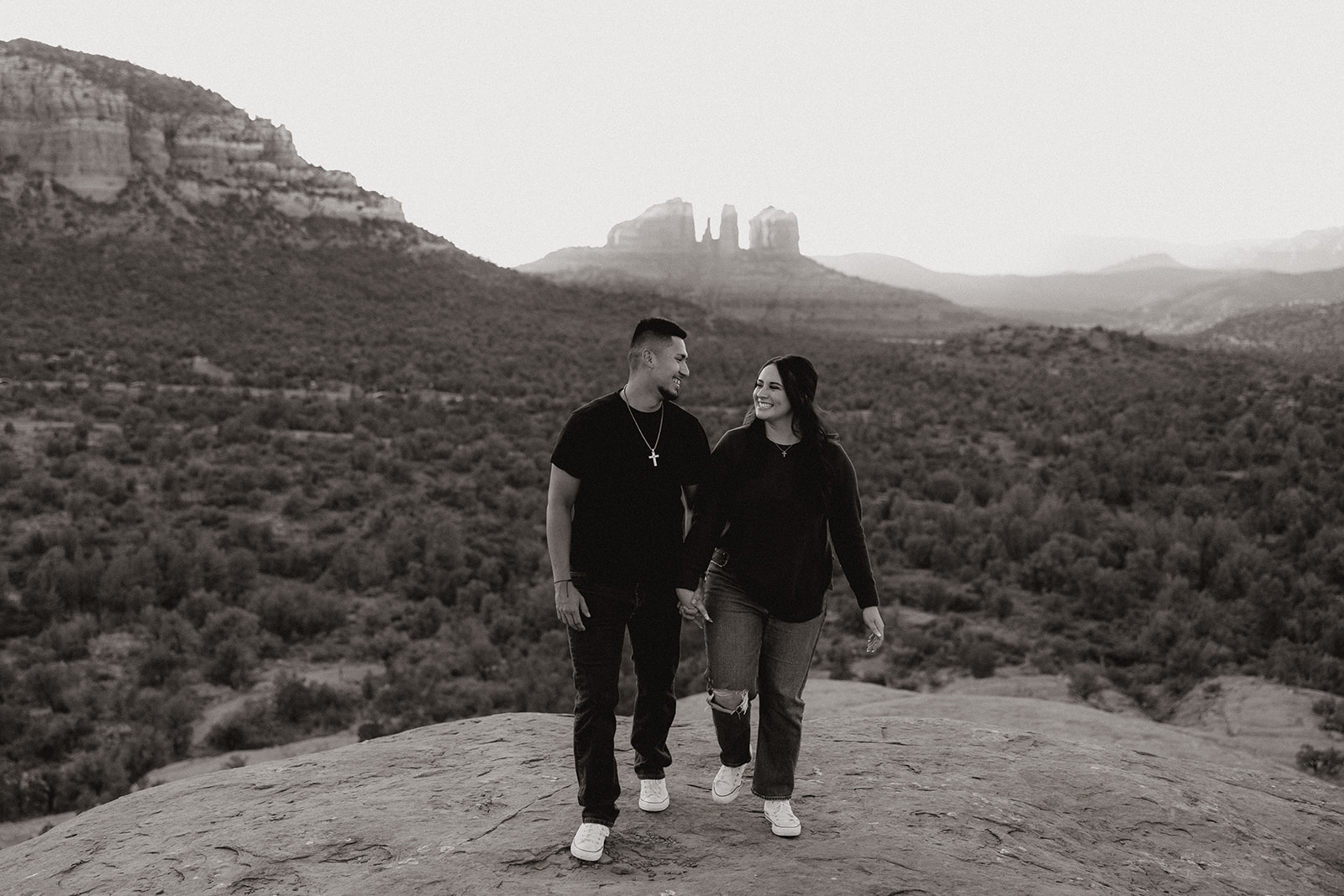 Couple pose during their dreamy west fork trail in Sedona Arizona engagement photoshoot 
