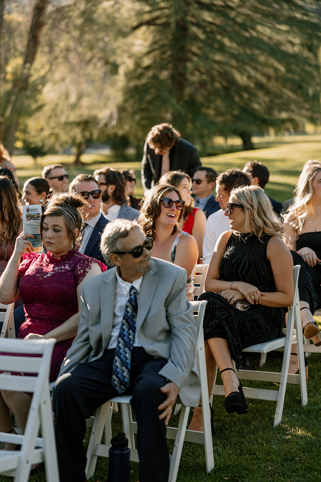 Guests anxiously look on as the stunning Arizona wedding ceremony unfolds