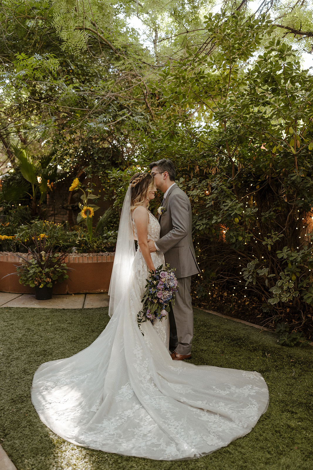 Beautiful bride and groom share an intimate moment after their dreamy Arizona wedding