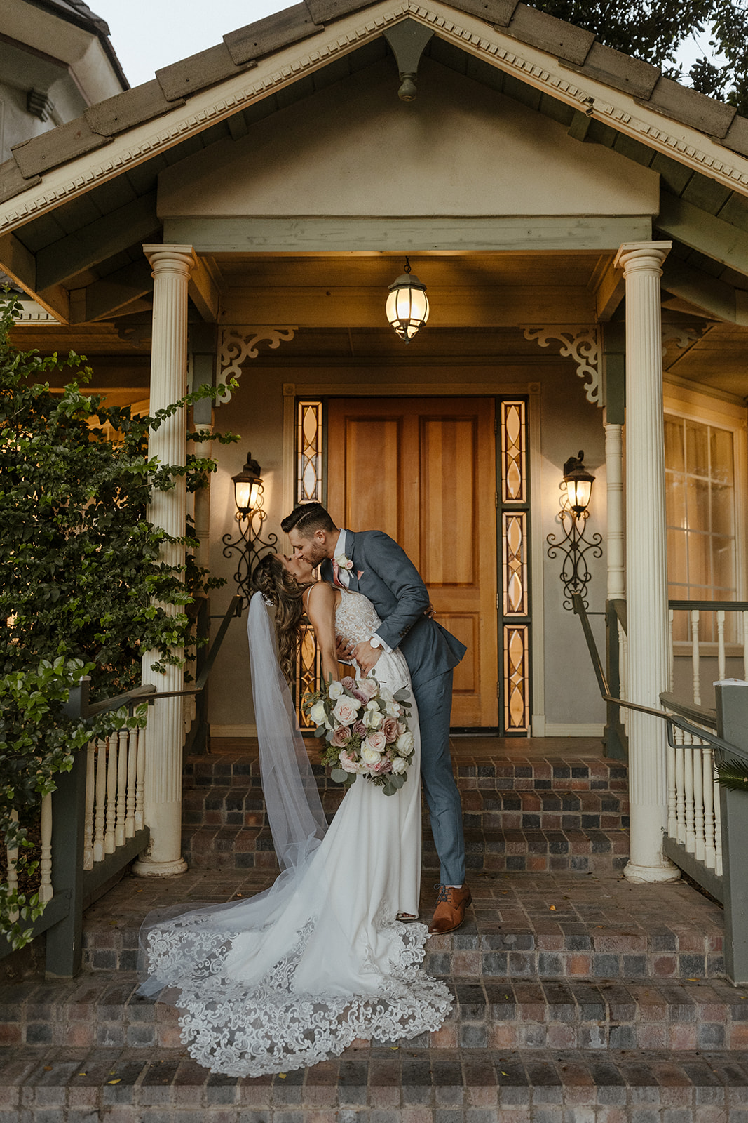 Beautiful bride and groom share a kiss during their stunning Arizona wedding day! 