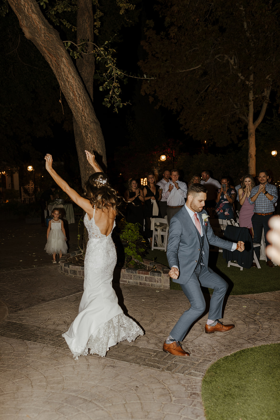 The stunning bride and groom dance the night away at The Wright House Garden Reception Center 