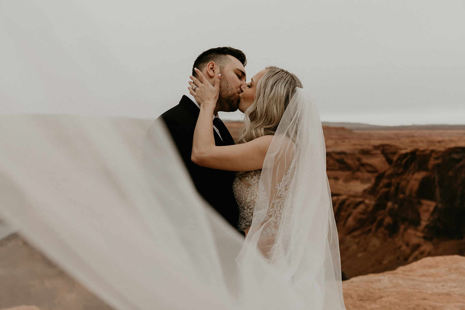 dreamy bride and groom pose together in stunning nature