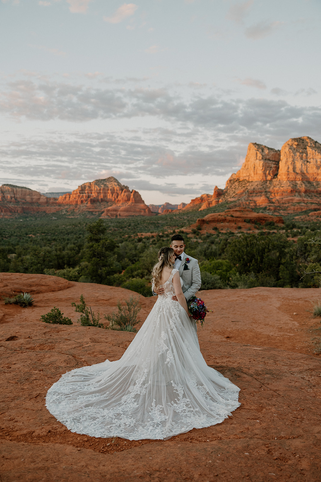 beautiful bride and groom pose together after their stunning Arizona desert elopement