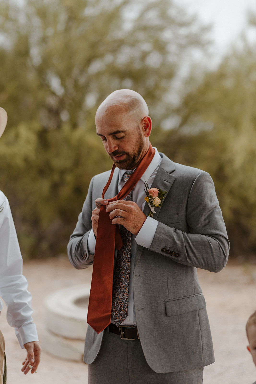 groom prepares his wedding day at lost dutchman state park