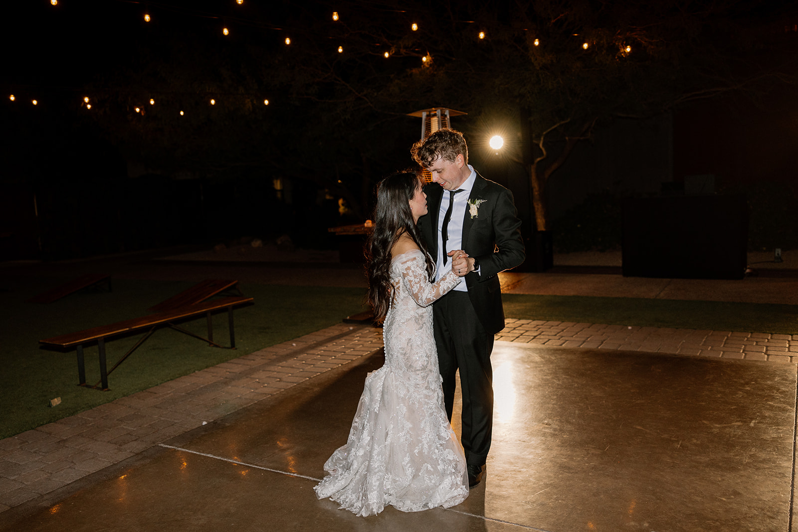 bride and groom share a first dance together 