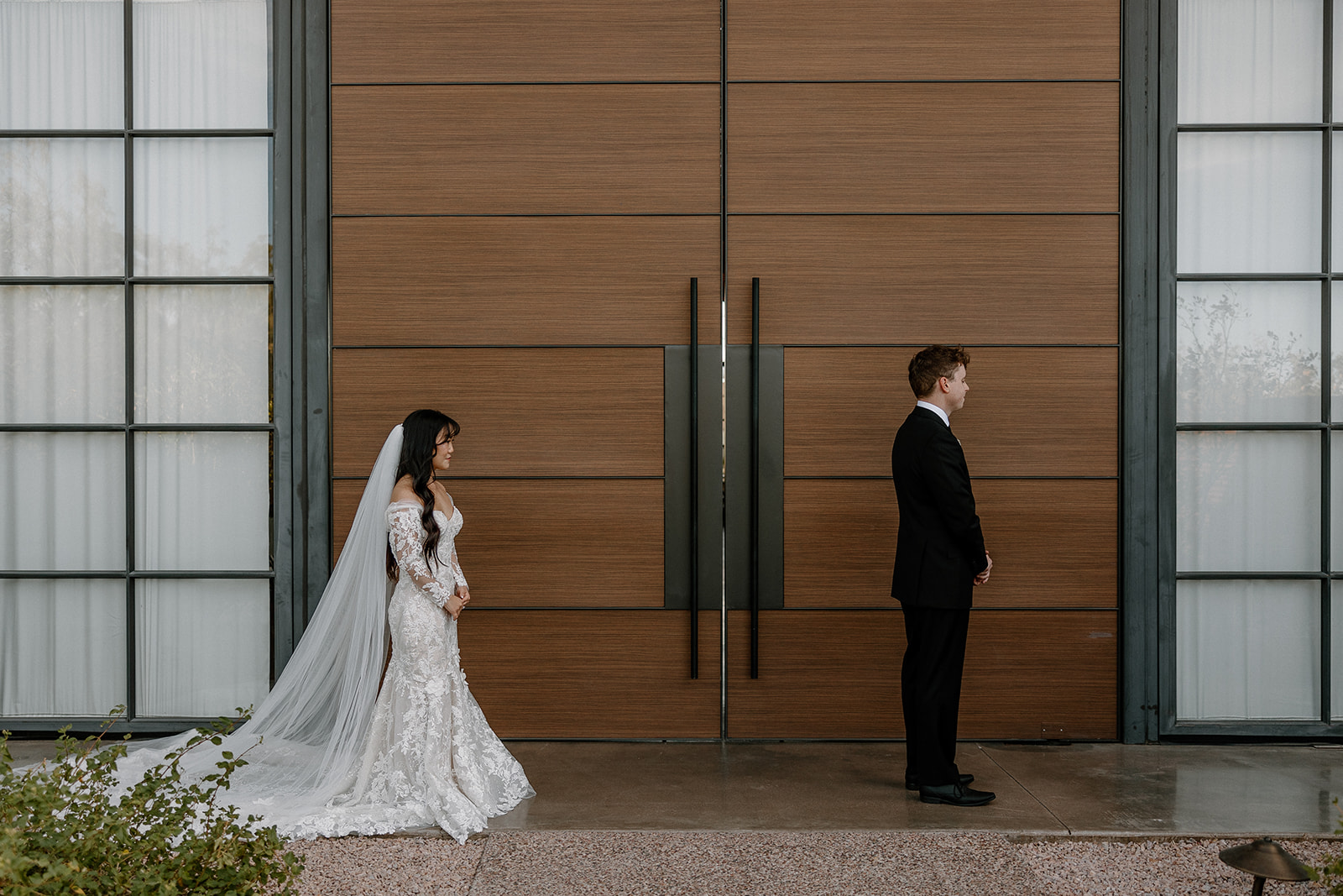 bride waits to surprise her soon to be husband for their heartwarming first look photos