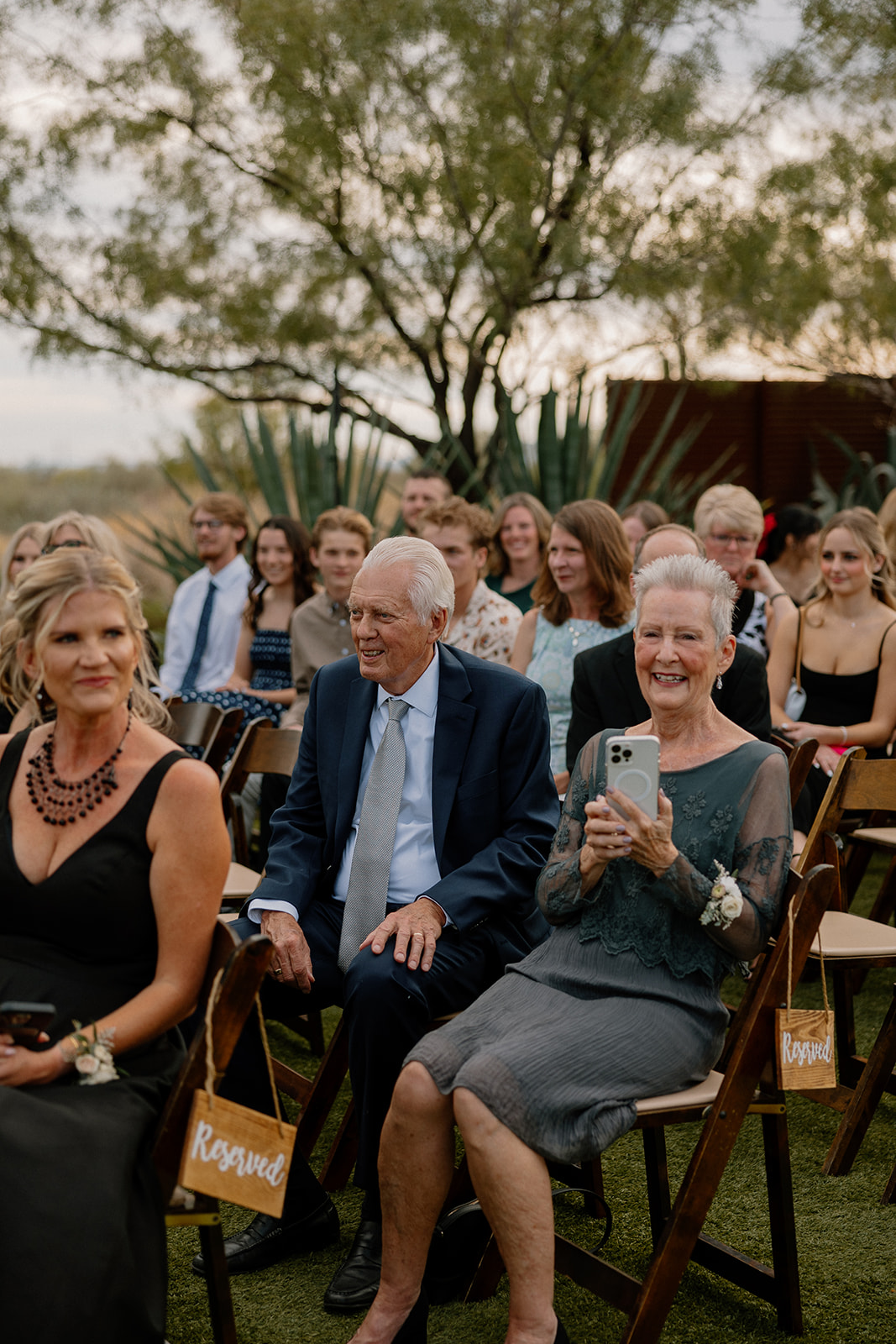 guests look on with a smile as the stunning bride enters the dreamy Arizona wedding day
