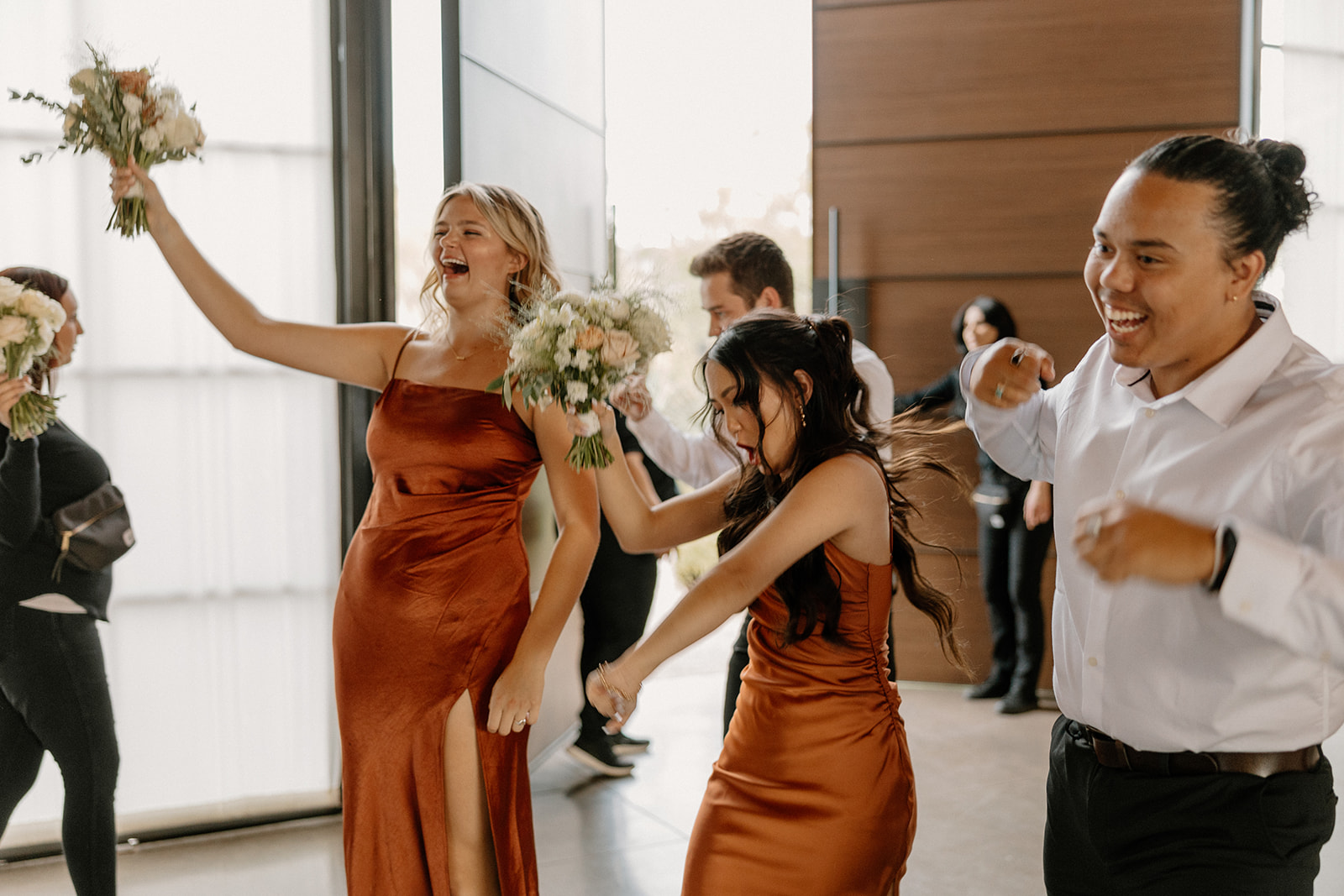guests dance together during the stunning desert wedding reception