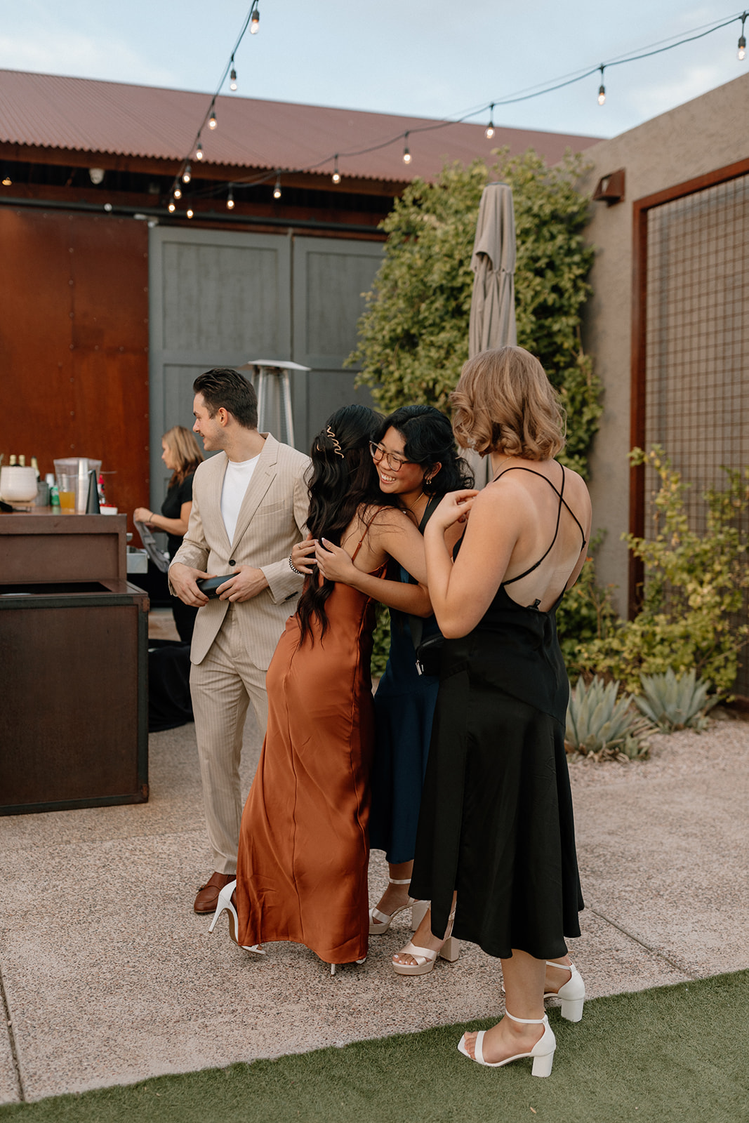 bridesmaids greet guests during the reception